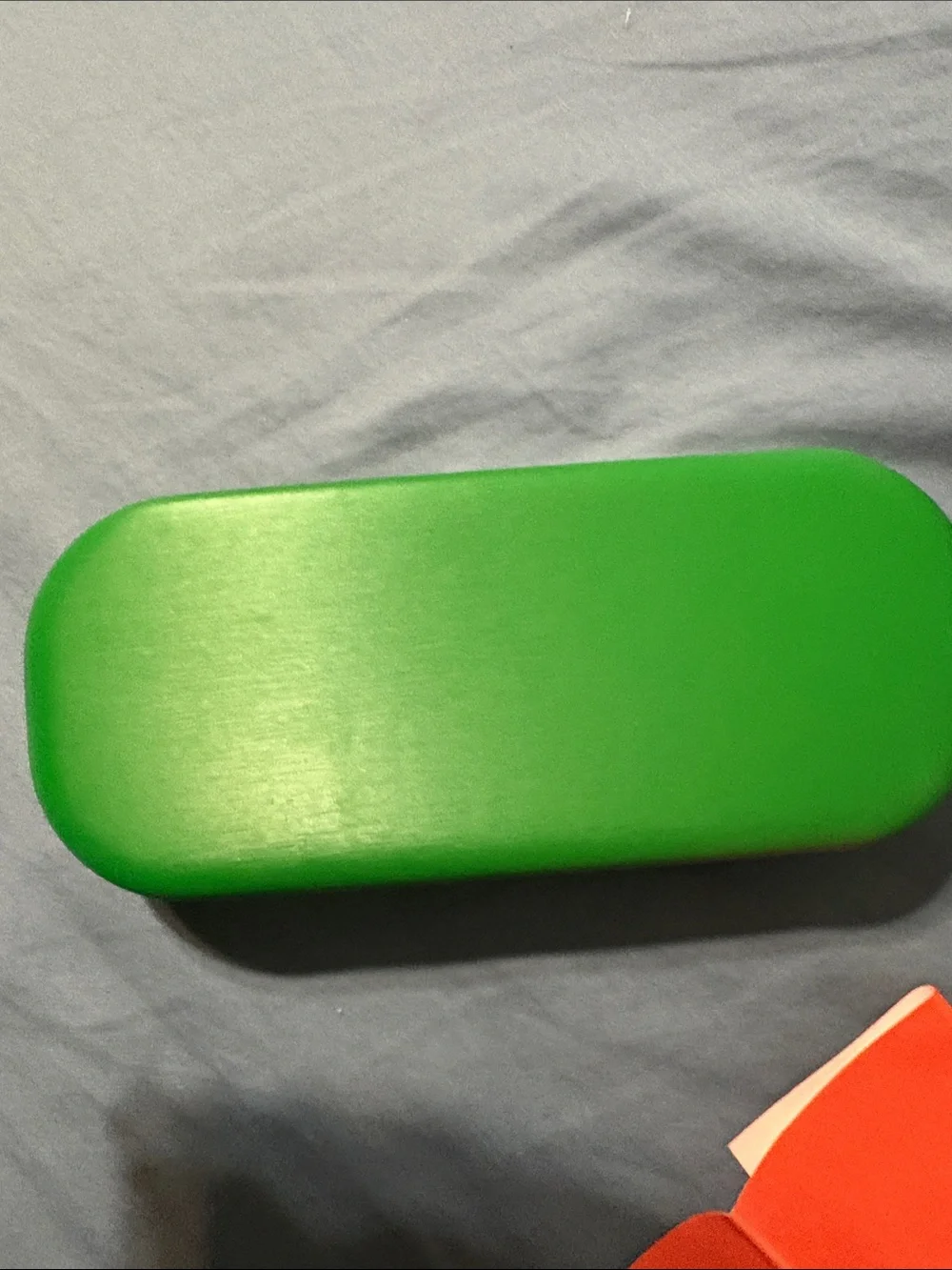 Green Eyeglass Case with Orange Cleaning Cloth